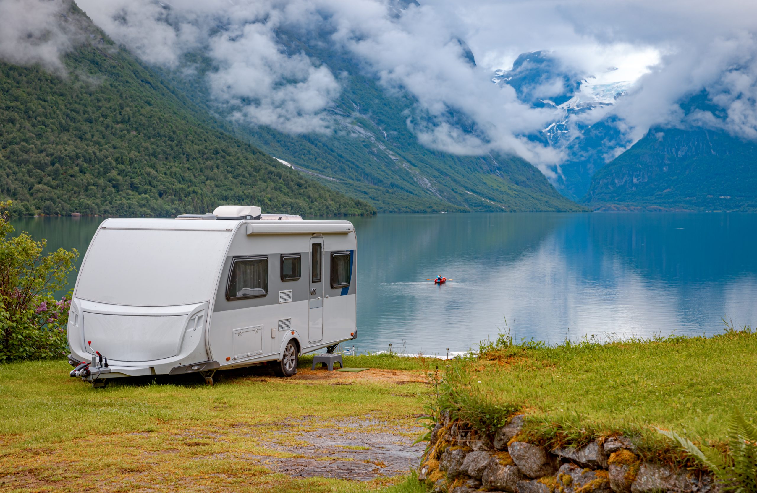 Family vacation travel RV, holiday trip in motorhome, Caravan car Vacation. Beautiful Nature Norway natural landscape.